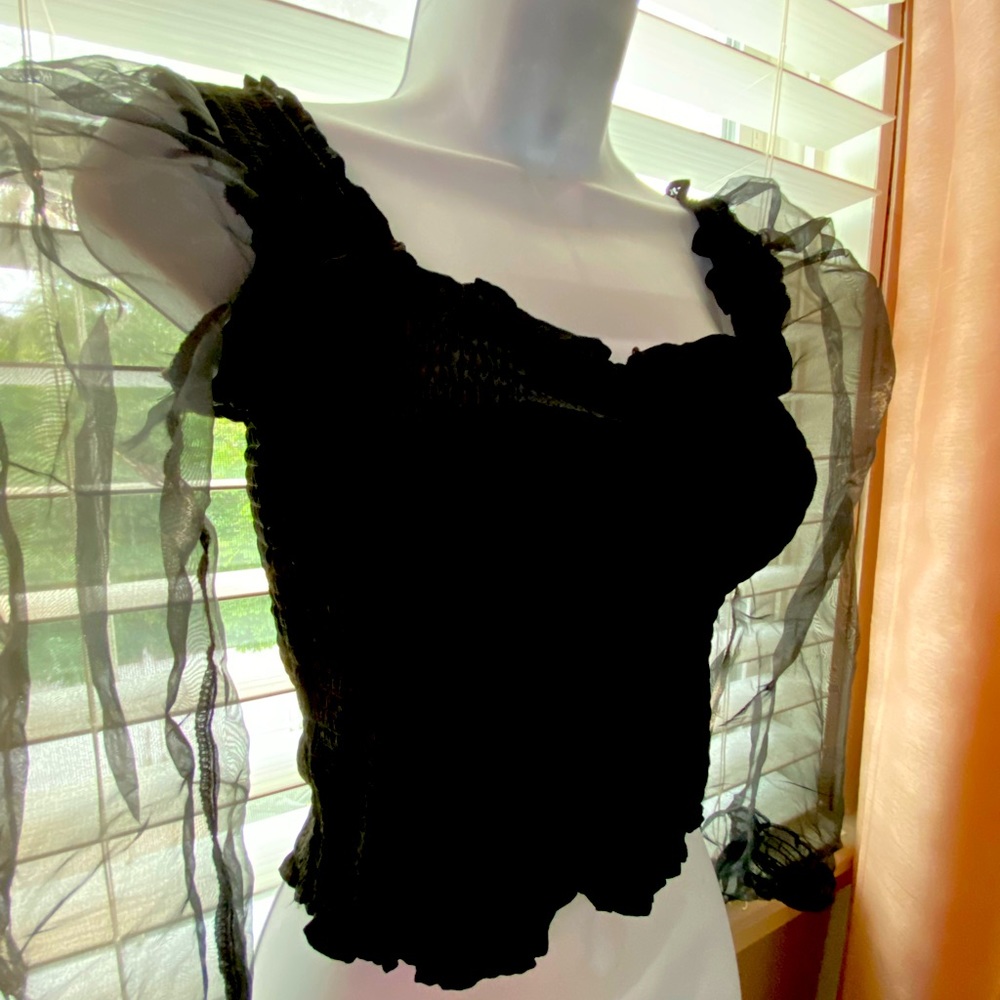 Small delicate black blouse